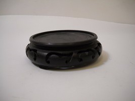 Vintage Black Wooden Figurine Stand Round With Cut Out Pattern Of Various Swirls - £23.73 GBP