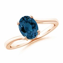 ANGARA Prong Set Oval London Blue Topaz Solitaire Bypass Ring in 14K Gold - £383.69 GBP