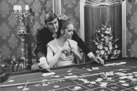 George Lazenby in On Her Majesty&#39;s Secret Service Diana Rigg at casino t... - $23.99