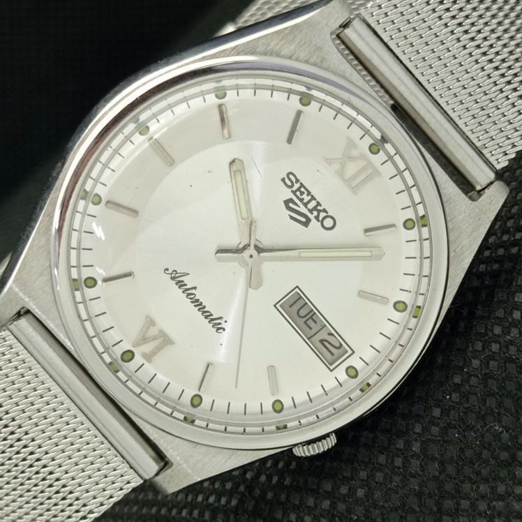 Primary image for VINTAGE SEIKO 5 AUTOMATIC 7019A JAPAN MENS DAY/DATE SILVER WATCH 621e-a415914
