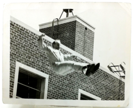 Original 1958 Black &amp; White Photo of Man Jumping Off Building Fireman Training - £7.91 GBP