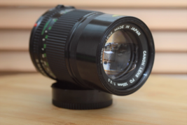 Gorgeous Canon FD 135mm f3.5 lens with built in lens hood. Pristine condition - $160.00