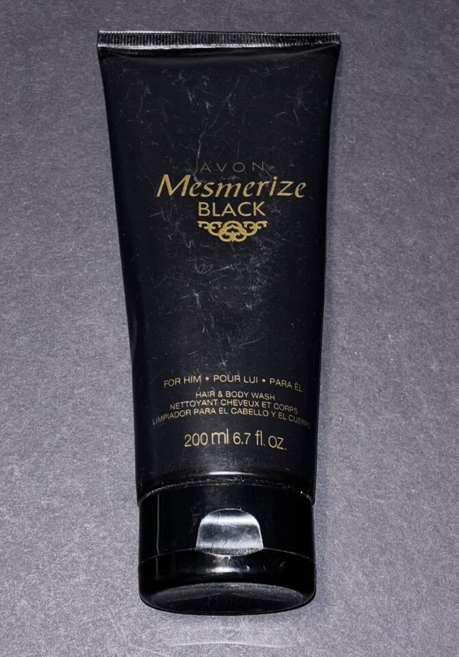 Primary image for Avon Mesmerize Black Hair and Body Wash for Him 6.7 fl. oz New Sealed