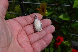 A 16.5 cwt. Untreated Earth Mined Opal Pendant. Independent Master Valued  $2700 - £1,016.08 GBP