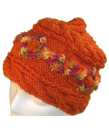 Orange hand knit hat with multi-color cable - $25.00