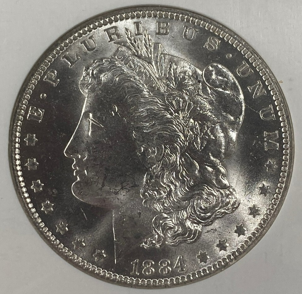 1884-O Silver Morgan Dollar Graded By NGC As MS-64! Superb coin of-
show orig... Item image 3