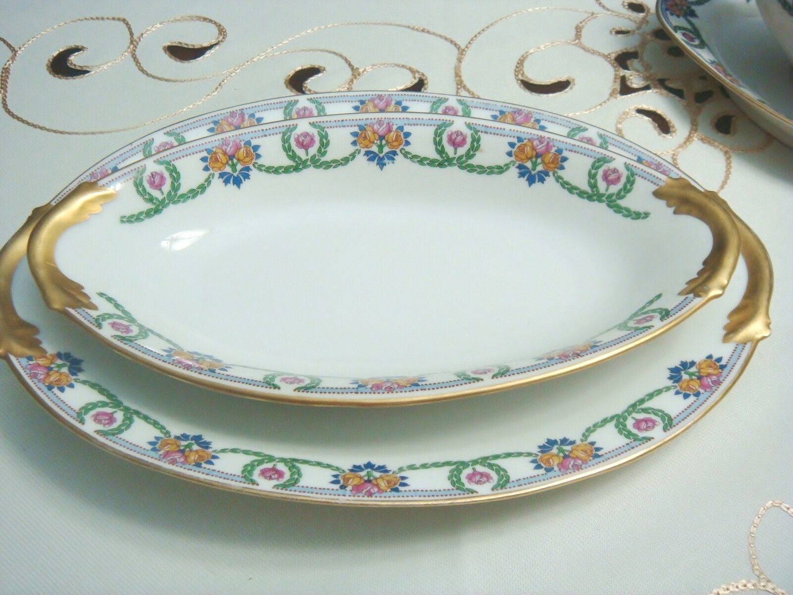 Primary image for Lucien Michelaud Fres Limoges France 1908-1962, 2 oval trays, golden handle [96B