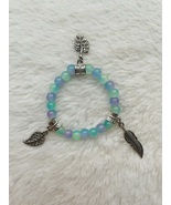 Blue, green, and purple Multi-colored glass bead bracelet with 3 feather... - $6.00