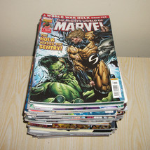 Job Lot THE MIGHTY WORLD OF MARVEL comic Books Over 35 pieces - $68.36