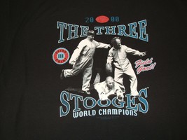 3 Stooges playing football on a new large (L) black short sleeve tee shirt - $22.00