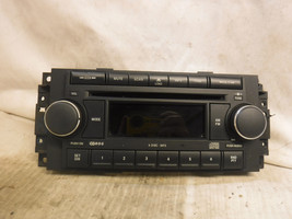 04-08 Chrysler Dodge Jeep Radio 6 CD MP3 Faceplate Replacement P05064072AE - $25.00