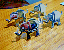 ELEPHANT SHAPED  CHROME PLATED NAPKIN HOLDERS  SET OF 4  LN CONDITION - $187.34 MXN