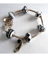Black &amp; White Lampwork Beads with Sterling Slipper Bracelet by Katherine... - $2,755.99 MXN