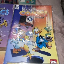 7-Walt Disneys Comics, Scooby Doo, Looney Tunes, Dockwing Duck - $9.89