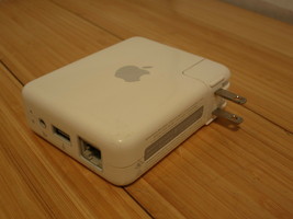 Apple Airport Express A1084 54 Mbps Wireless G Router (M9470LL/A) - $14.95