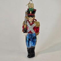 Old World Christmas Ornament Blown Glass Toy Soldier Red Blue Glitter Hanging - £11.68 GBP