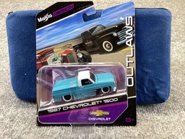 1987 Chevrolet 1500 &quot;Outlaws&quot; 1:64 Scale Diecast Model Truck - Maisto 15494 - £6.25 GBP