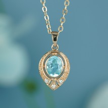 Natural Blue Topaz and Diamond Vintage Style Pendant in solid 9K Yellow Gold - £336.54 GBP