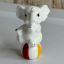 Vintage Ceramic Elephant Figurine Sitting on Ball White Red Yellow Blue ... - $15.00