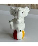 Vintage Ceramic Elephant Figurine Sitting on Ball White Red Yellow Blue ... - $15.00