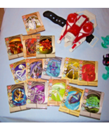 9 Bakugan Battle Brawlers, Wrist Launcher, 14 Metal Cards, 13 Regular Cards - $55.00