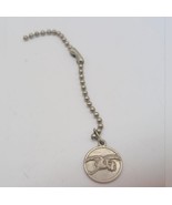 Silver tone st francis hospital stork charm - $347.27 MXN