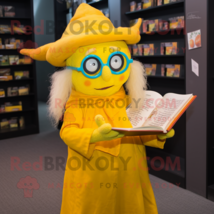 Yellow Witch mascot costume character dressed with a Playsuit and Reading glasse - £946.11 GBP