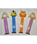 VINTAGE LOT OF 4 PEZ DISPENSERS - LAMB CHOP, DAFFY DUCK, GARFIELD, LAMB ... - $163.44 MXN