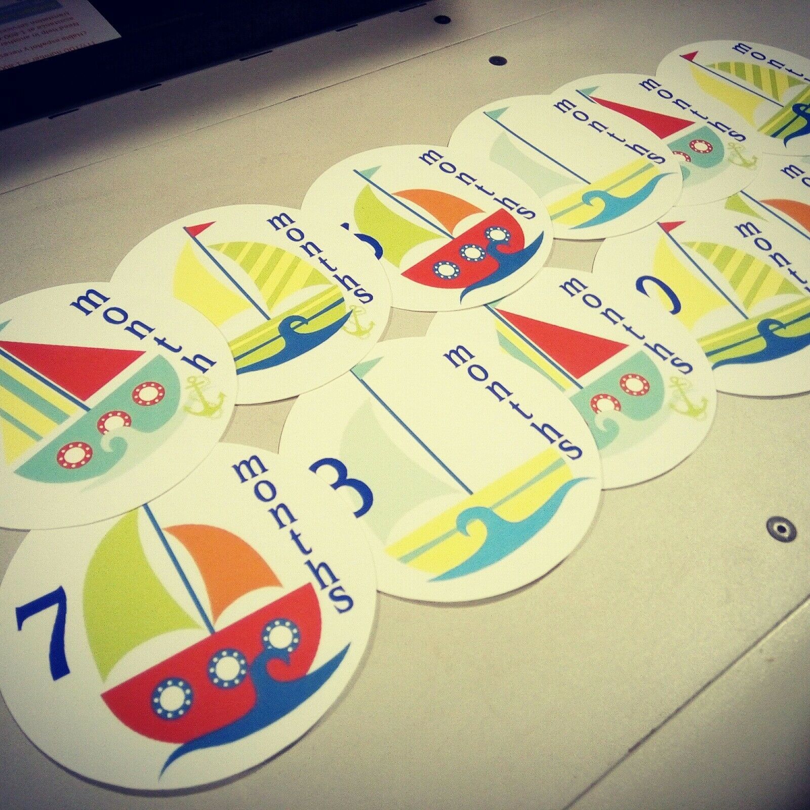 Monthly baby stickers. Sailboats bodysuit infants month labels