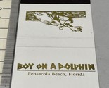 Matchbook Cover  Boy On A Dolphin restaurant Pensacola Beach, FL  gmg  U... - $12.38