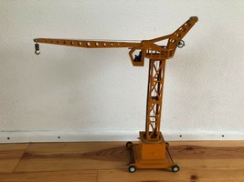 Vintage tin joustra france harbour crane. Clockwork - $325.00