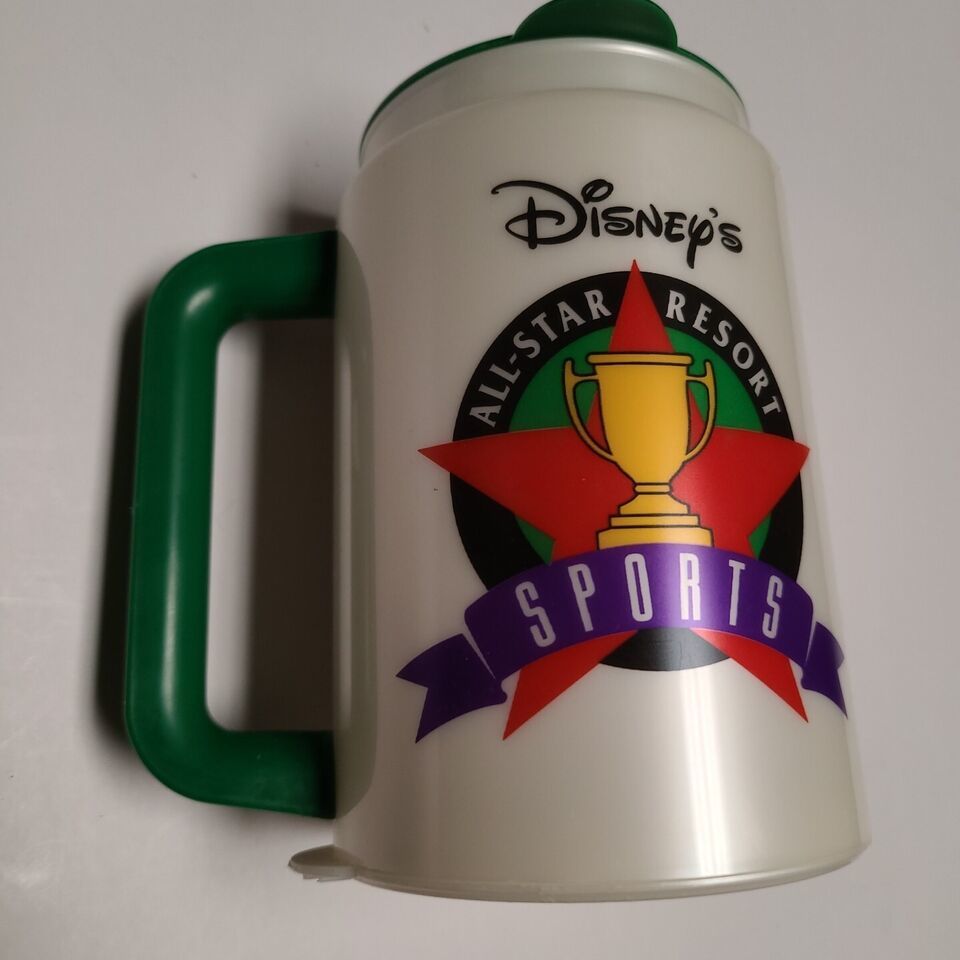 VINTAGE Disney's All-Star Resort Sports Travel Mug Cup With Lid Coca-Cola Green - $9.78