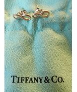 Authentic Tiffany &amp; Co. Infinity Sterling Silver Stud Earrings with Bag - $175.85
