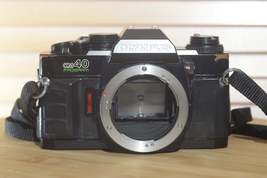 Rare Black Olympus OM40 programme SLR (body only).  Great condition. - £94.36 GBP