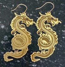 dragon etched raw brass gold and black dangle earrings - $10.00