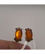 Amber colored rhinestones clipped on earrings - €9,33 EUR
