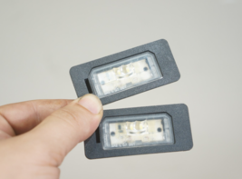 2011-2016 bmw x3 x5 535i 528i 135i number license plate light bulb pair LED - $591.55 MXN