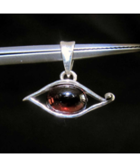 Eye shaped Sterling silver Pendant with a natural Dark Red Garnet Gemsto... - $30.00