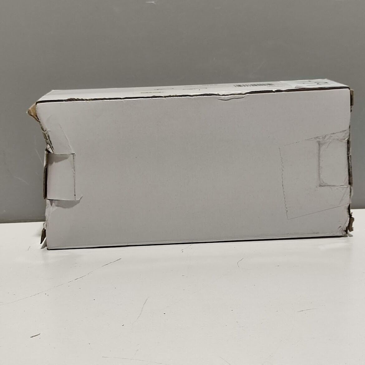 Delta Ashlyn Wall Mounted Pivoting Toilet Paper Holder Matte Black