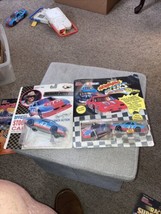 Racing Champions 1:43 &amp; 1:64 Scale NASCAR Richard Petty #43 cars &amp; card set of 2 - £7.52 GBP