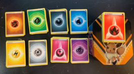 Pokémon Lot: 182 Energy Cards - All Different &amp; Eevee Tin - £27.88 GBP