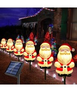 6-Pack Solar Christmas Garden Stake Lights, Outdoor Waterproof Solar San... - $39.53 CAD
