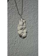 Natural rough magnesite pendant with silverplated bail - $324.53 MXN+
