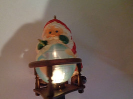 Vintage 1988 Hallmark Keepsake Magic Lighted Ornament Santa Circling Globe - $9.89