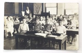Vtg RPPC of Elementary School Children at Desks Teacher in Back Exposure Issues - £14.38 GBP