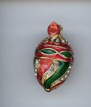 Russian Fabergé Egg Pendant With A Swirl Design In Red/Green Colours-
sh... - $23.89