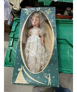 old doll in box