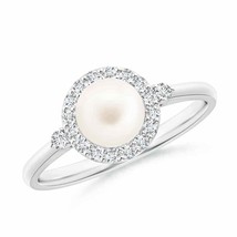 Authenticity Guarantee

Freshwater Cultured Pearl Halo Engagement Ring in 14K... - £481.89 GBP