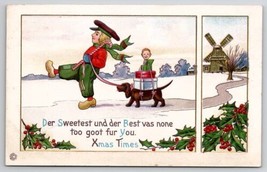 Christmas Dutch Boy With Dachshund Carrying Gifts Postcard U27 - £9.35 GBP
