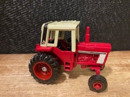 Vintage International Harvester metal tractor matchbox size. Approx 2.5&quot; - $8.78